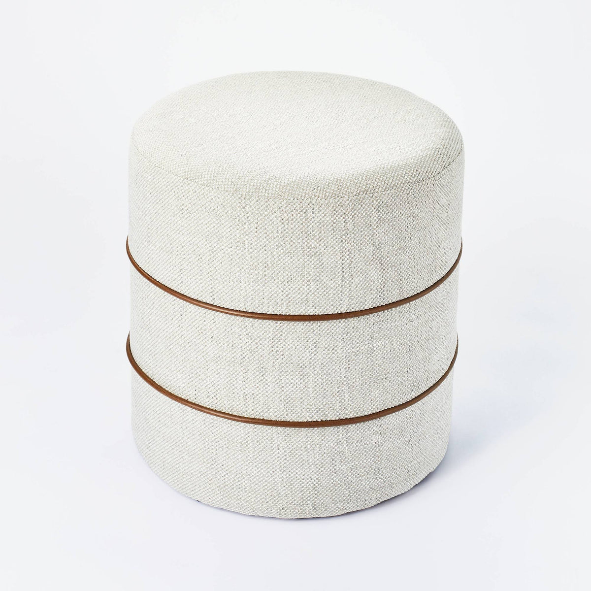 Cream Round Ottoman with Leather Piping D134660